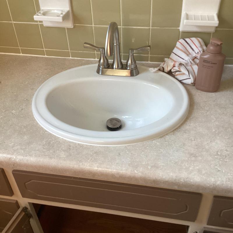 Vanity faucet and sink with soap dispenser and towel