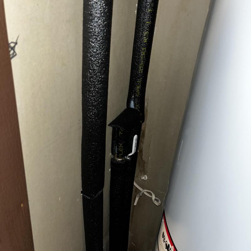 Water heater shut off valve with insulation and piping Water heater shut off valve with insulation and piping