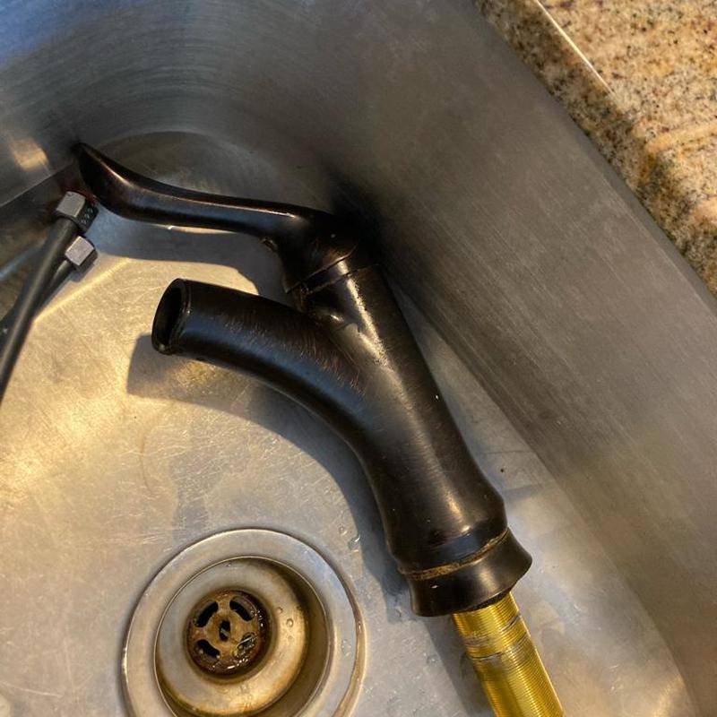 Kitchen faucet removed set inside stainless steel sink