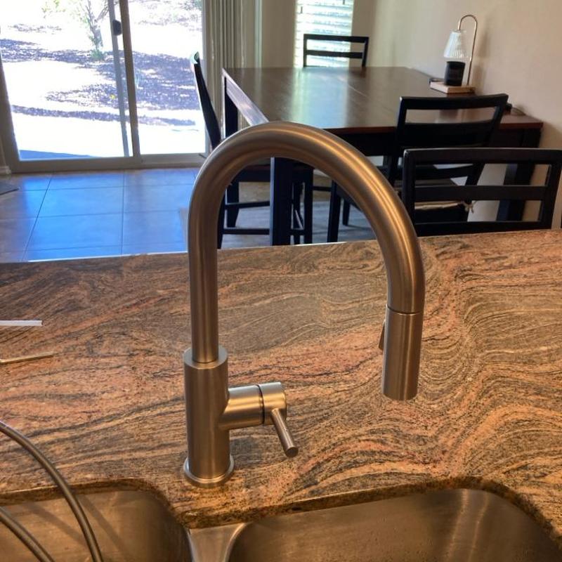 Pull-down kitchen faucet installation on granite sink