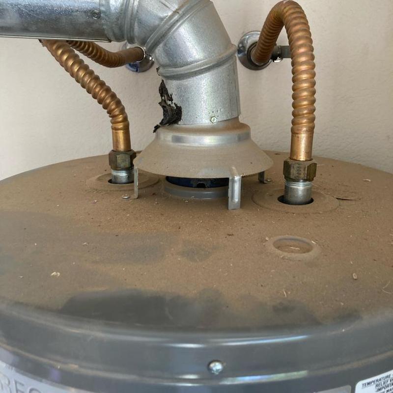 Gas water heater flex lines and vent piping connections