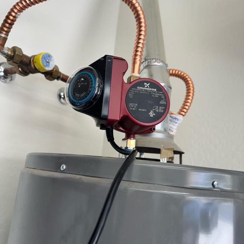 Recirculating pump and copper piping on water heater