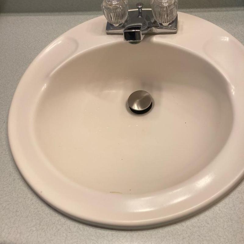 Kohler bathroom sink drain with faucet and knobs