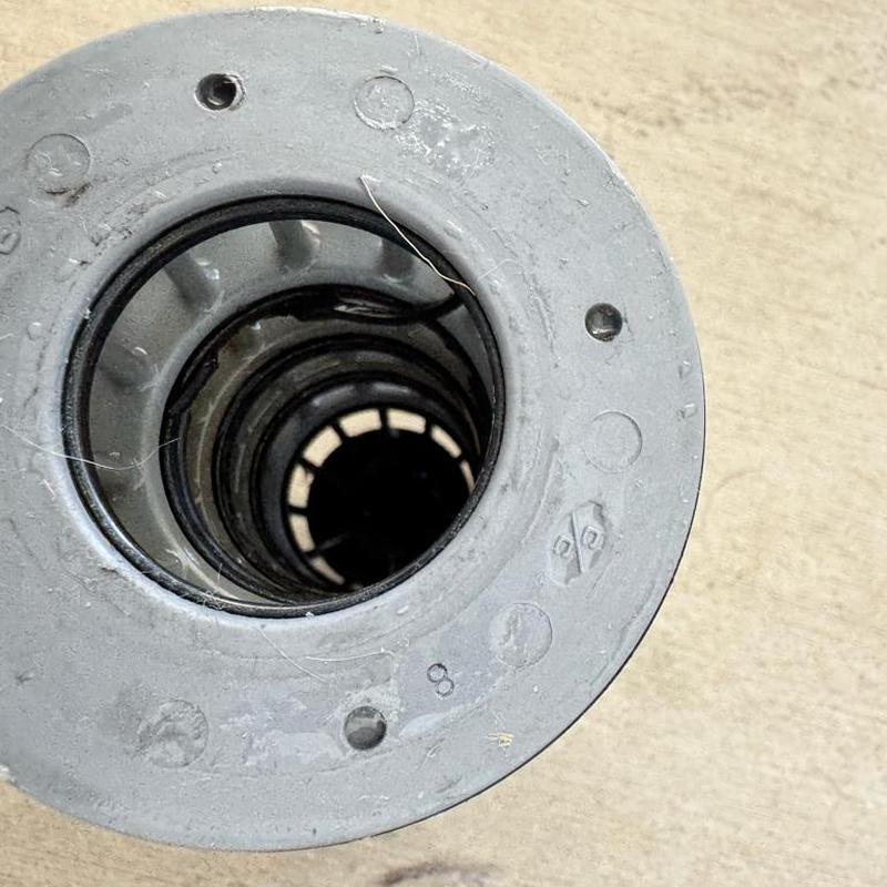 Water softener seal stack kit close-up in laundry room