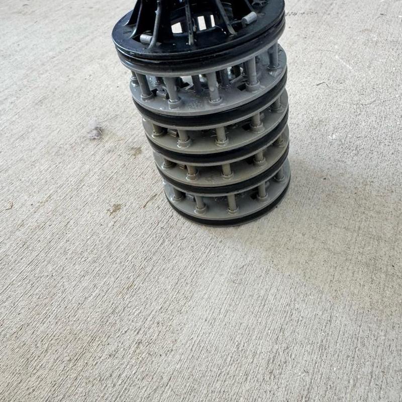 Water softener seal stack kit on concrete surface