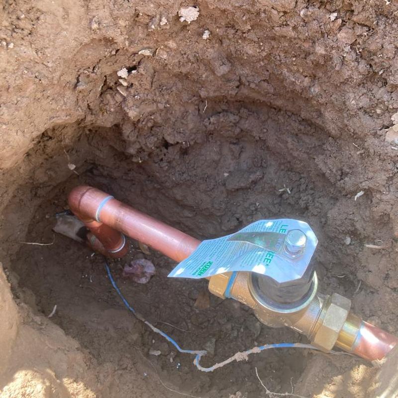 Copper main water line with pressure reducing valve installed