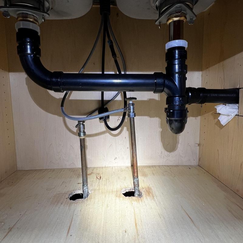 Kitchen drain plumbing with new P trap and extensions Kitchen drain plumbing with new P trap and extensions