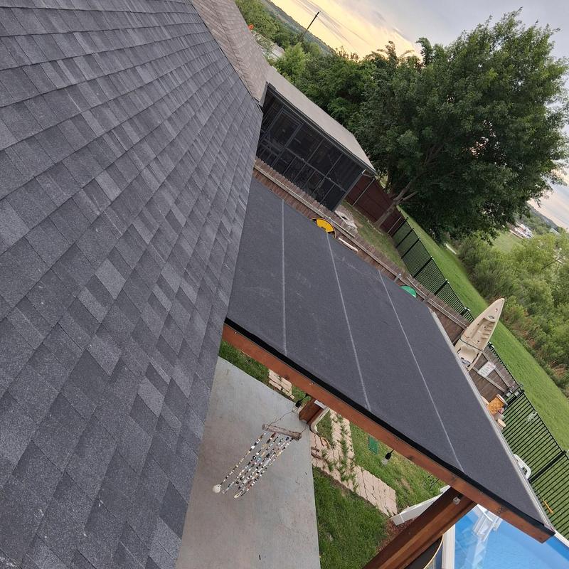 Flat roof overlay on backyard patio cover, Onyx black