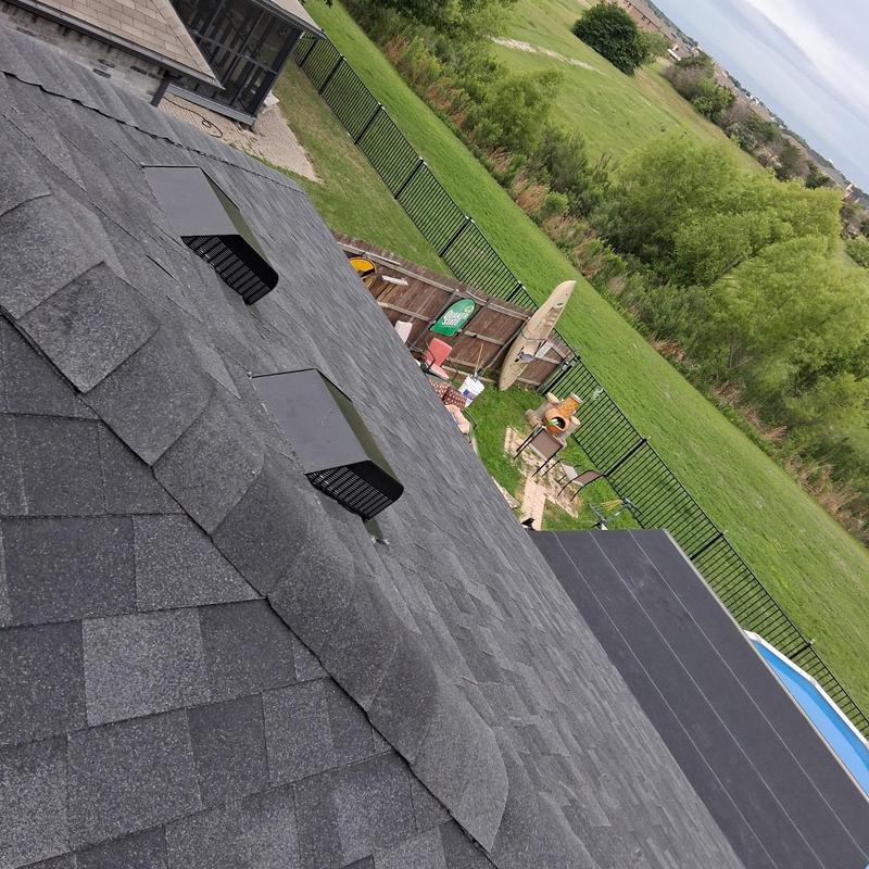Onyx black asphalt shingle roof with vents