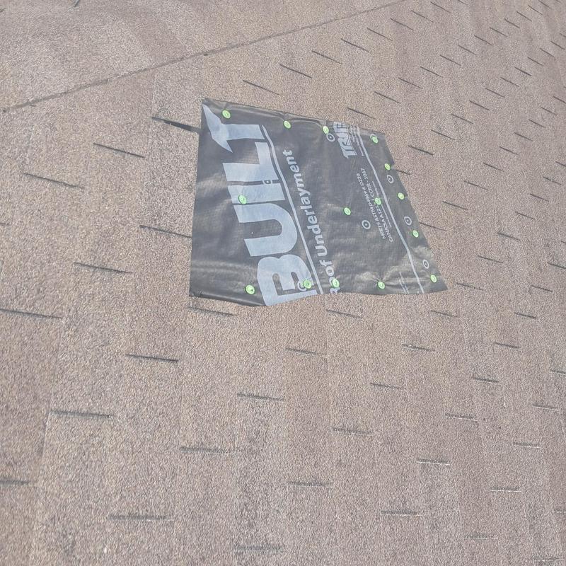 Synthetic roof underlayment patch over missing shingles