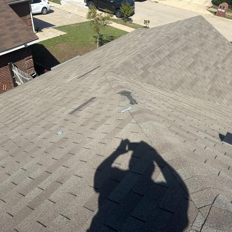 Asphalt shingle roof with inspection markings in Crowley TX