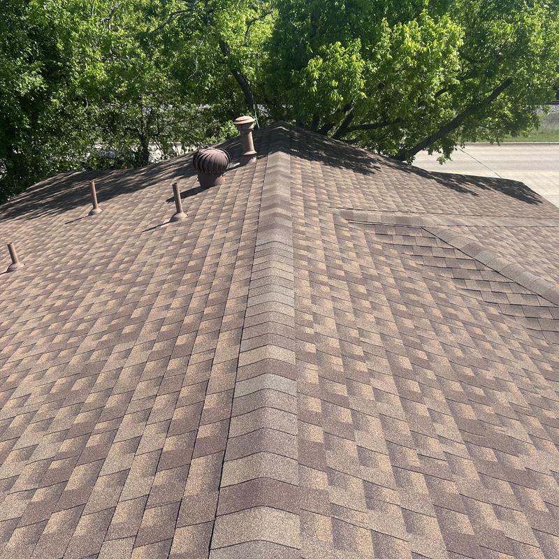Asphalt shingle roof with vents and turbine vent