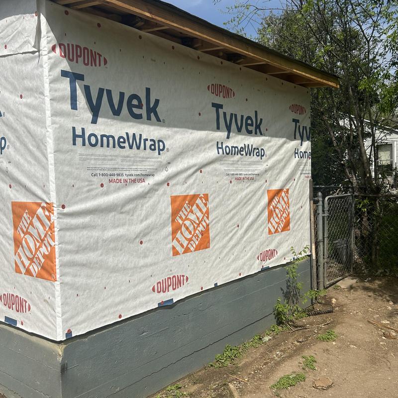 Tyvek HomeWrap installation for siding preparation