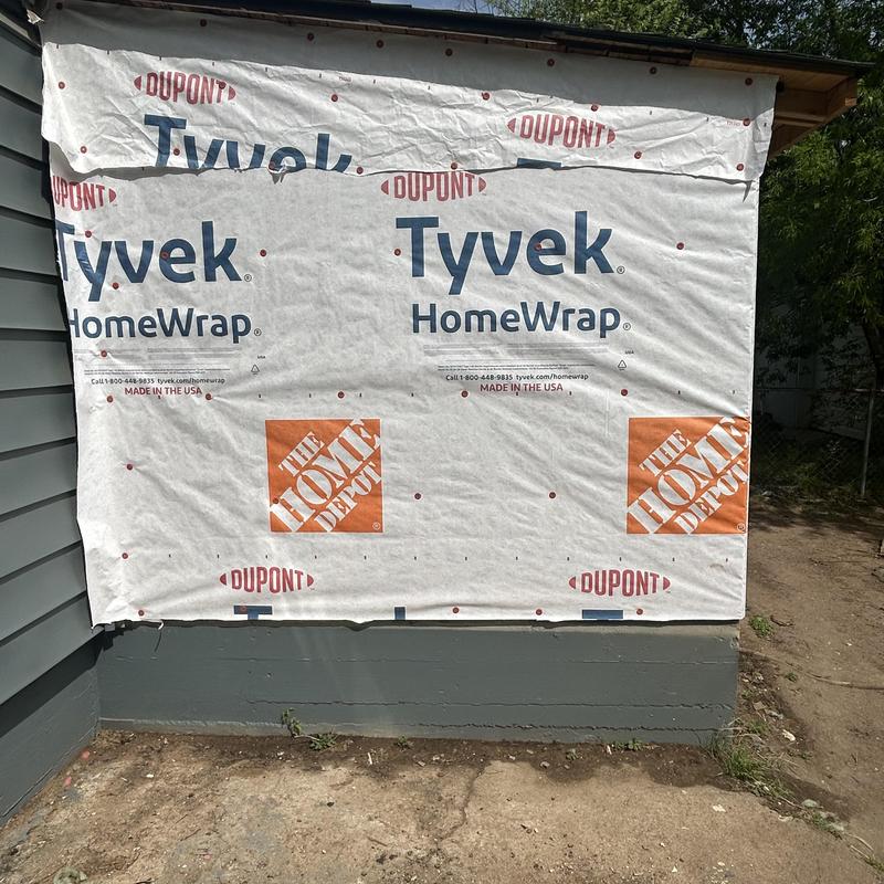 Tyvek HomeWrap installation on siding project prep