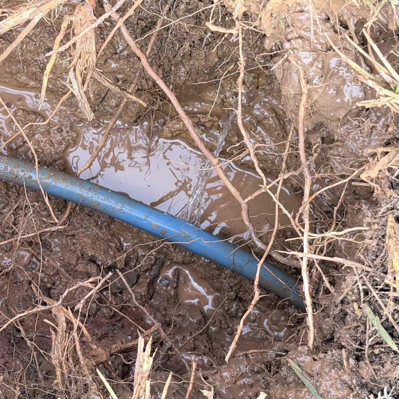 Underground leaking water line with muddy excavation