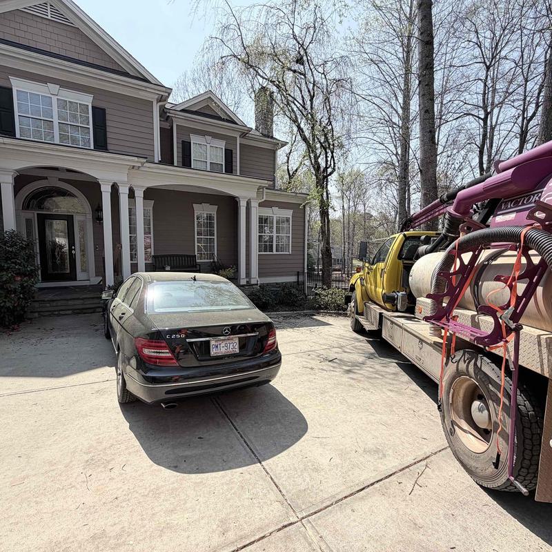 Underground PEX and PVC piping near tree roots with vac truck