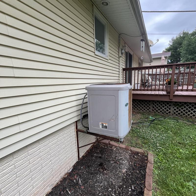 Carrier air conditioner compressor unit on wall mount