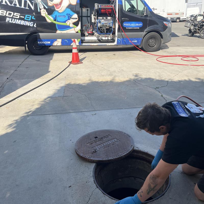 Grease interceptor hydro jetting with van and technician