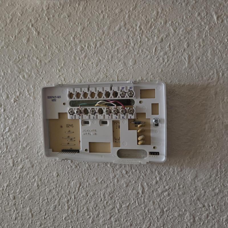 Thermostat baseplate wiring on textured wall