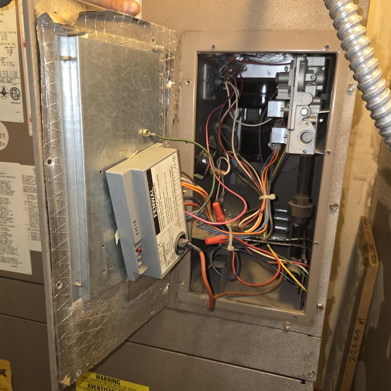 Furnace control module and wiring inside access panel
