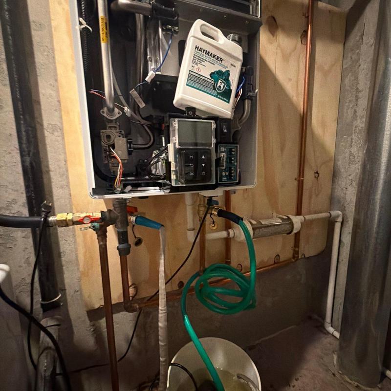 Heat exchanger flush with Haymaker descaler and hoses