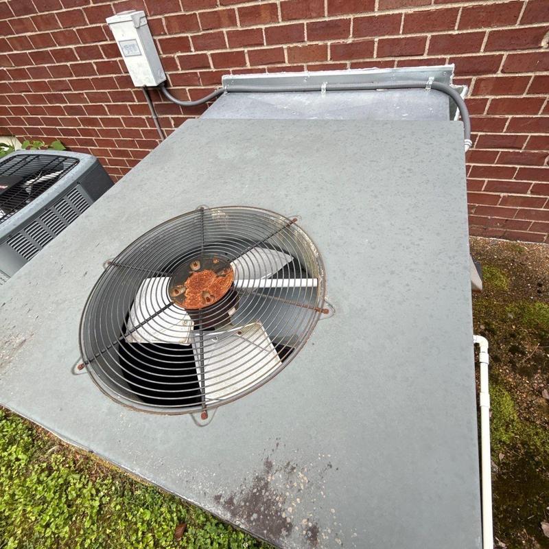 Rusted fan motor on outdoor HVAC unit