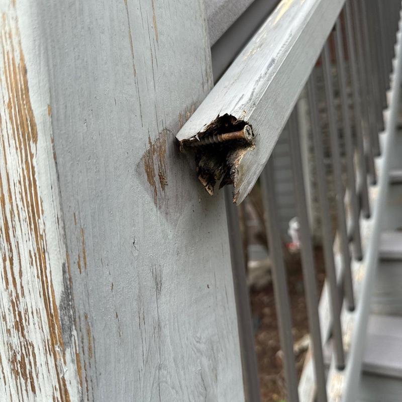 Deck handrail with broken and splintered wood end