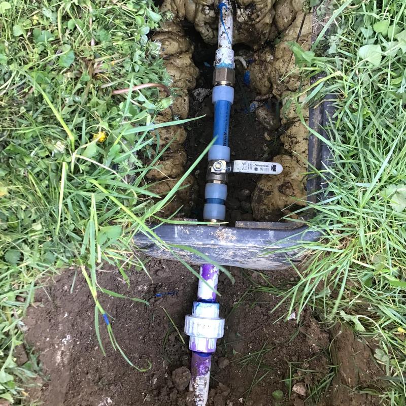Outside ball valve and irrigation pipe in ground
