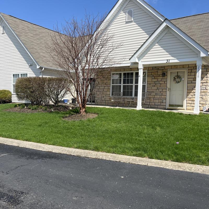 Asphalt shingle roof on residential home exterior Asphalt shingle roof on residential home exterior