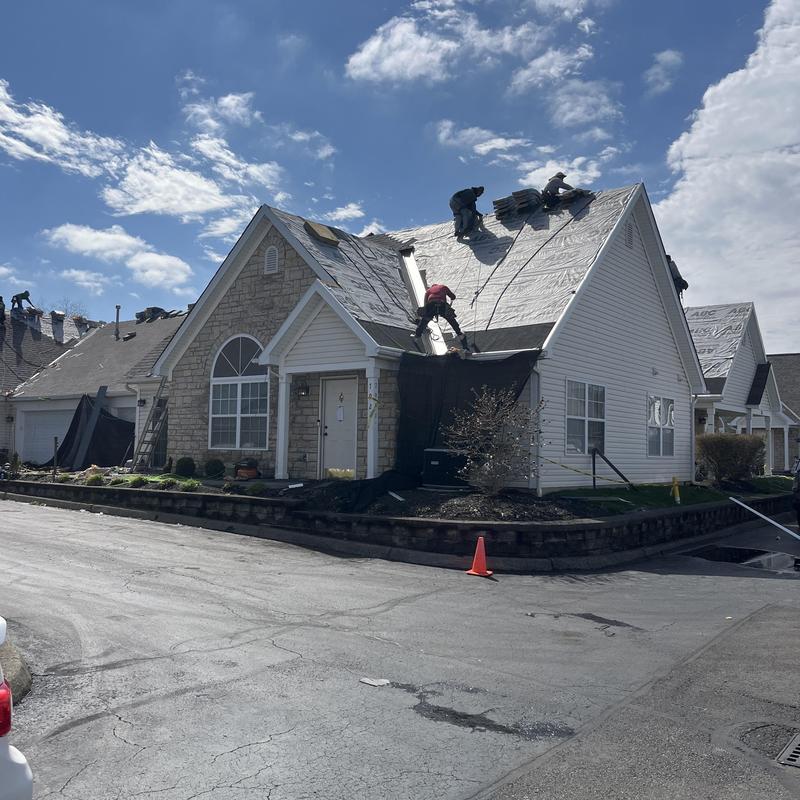 Roof shingles installation on residential home in Canal Winchester Roof shingles installation on residential home in Canal Winchester