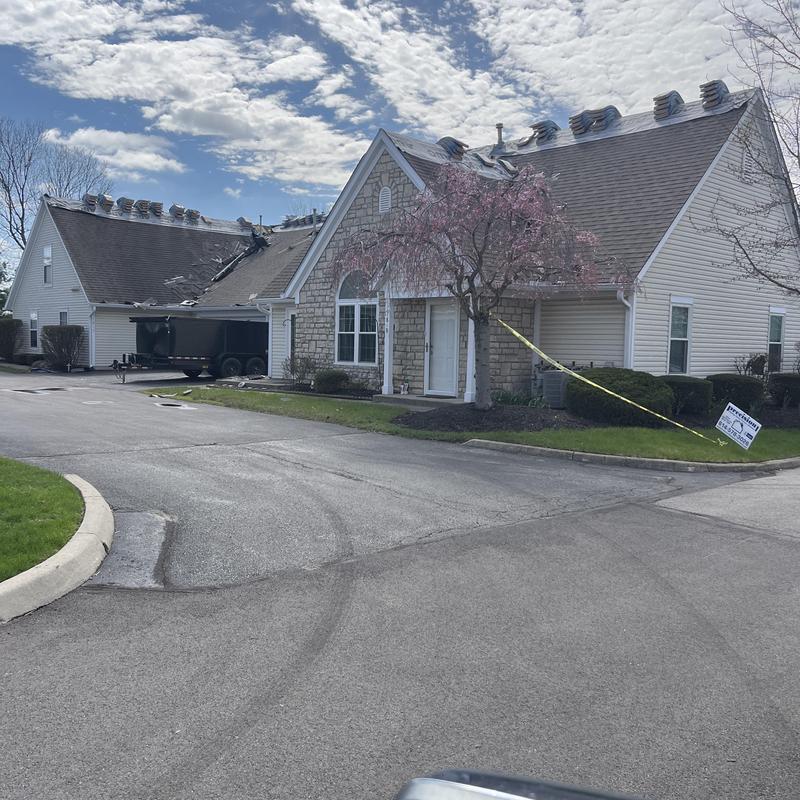 Asphalt shingle roofing installation on residential building Asphalt shingle roofing installation on residential building