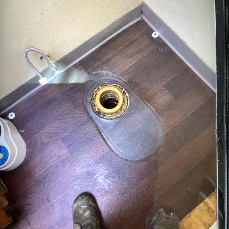 Toilet flange and wax seal with floor plumbing exposed