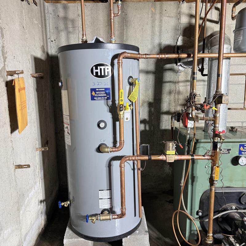 Water heater with copper piping installation in basement Water heater with copper piping installation in basement