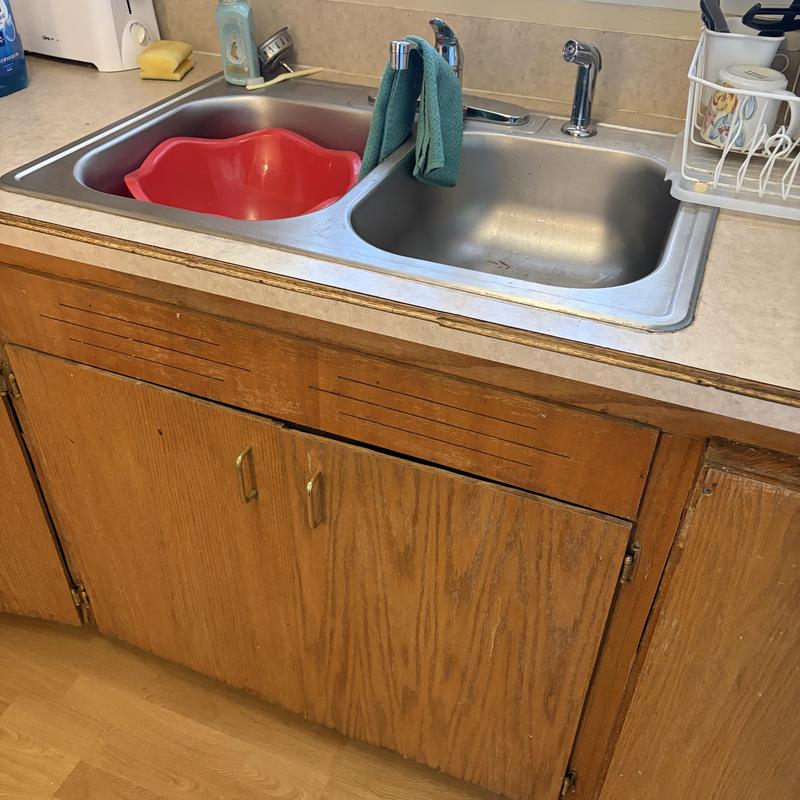 Kitchen faucet and basket strainer with sink and cabinet Kitchen faucet and basket strainer with sink and cabinet