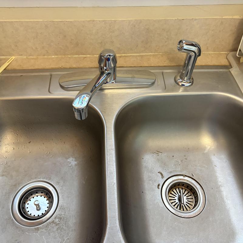 Kitchen sink faucet and basket strainer installation Kitchen sink faucet and basket strainer installation