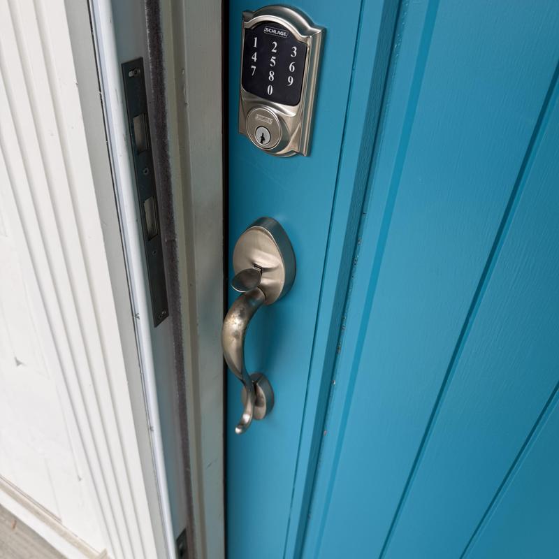 Schlage keypad lock and entry handle on blue door