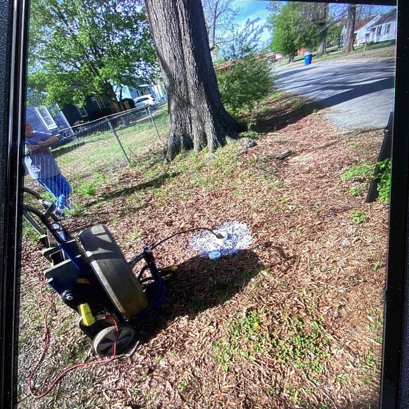 Mainline sewer drain with cleanout access clearing tool