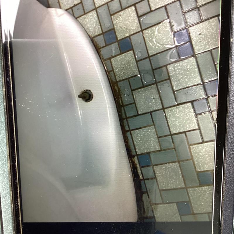 Men's commode reset with new wax seal and tiled floor