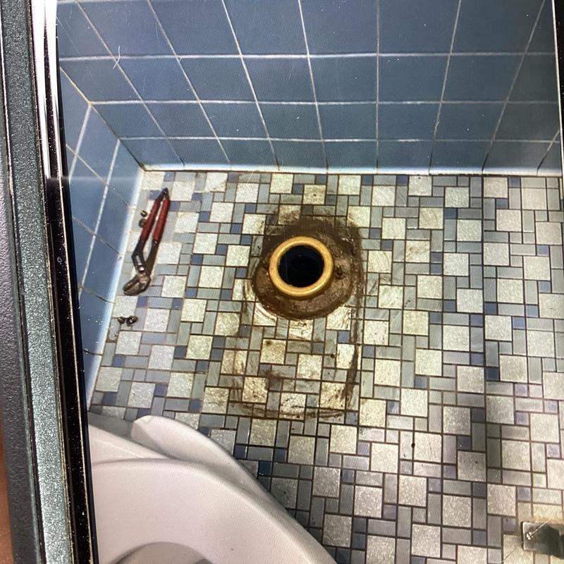 Men's commode flange with old wax seal removed