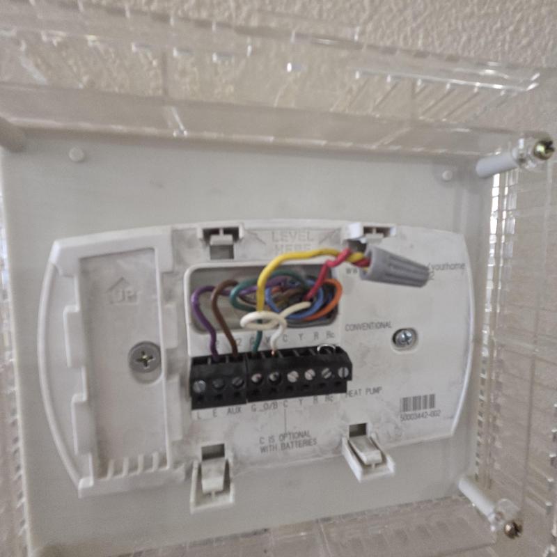 HVAC thermostat wiring inside wall panel