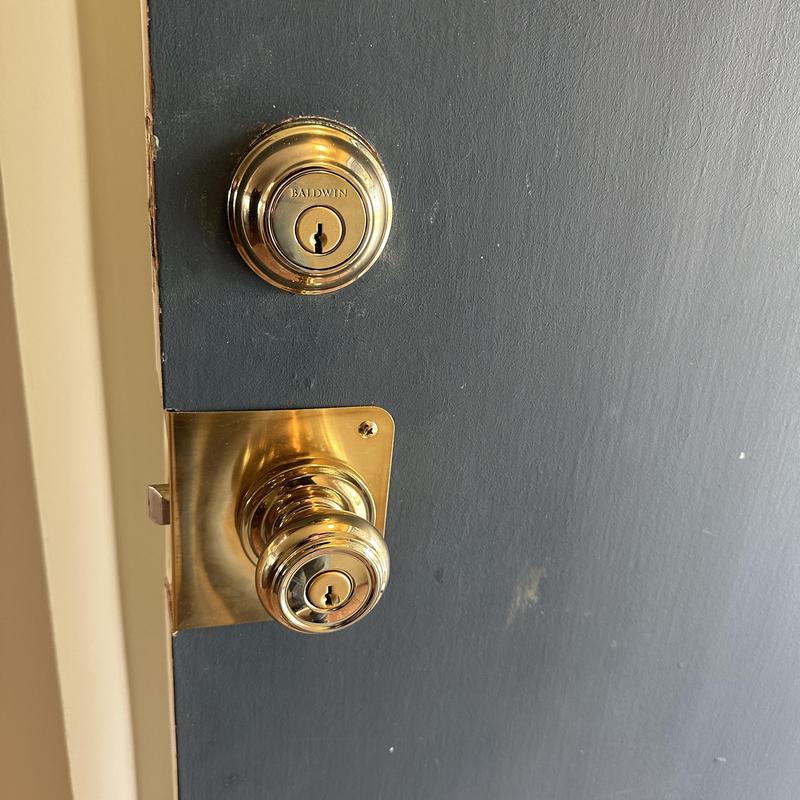 Baldwin door lock set with inset wrap and redrilled holes