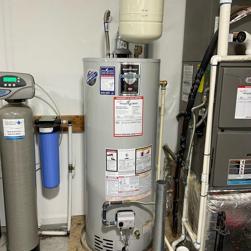 Water heater with expansion tank and pressure valve installed Water heater with expansion tank and pressure valve installed