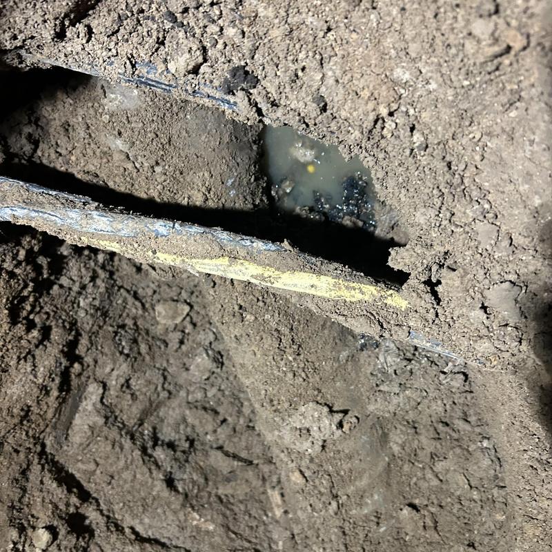 Sewer mainline with back-graded drain and blockage Sewer mainline with back-graded drain and blockage