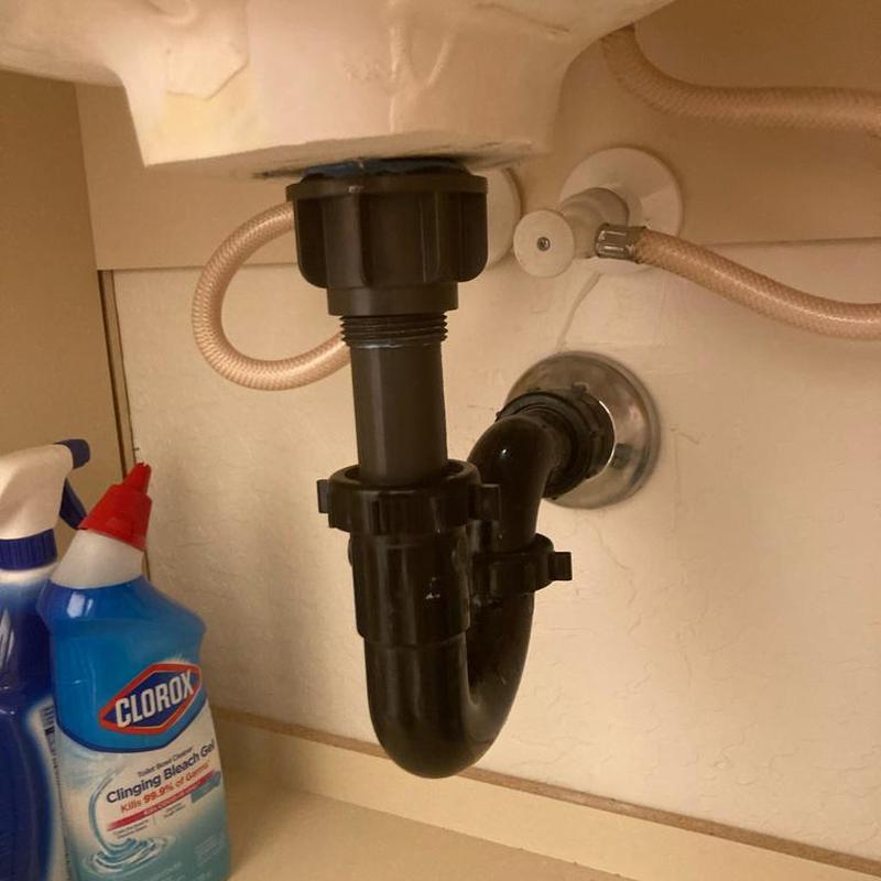 Bathroom sink P-trap drain pipe installation with cleaning Bathroom sink P-trap drain pipe installation with cleaning