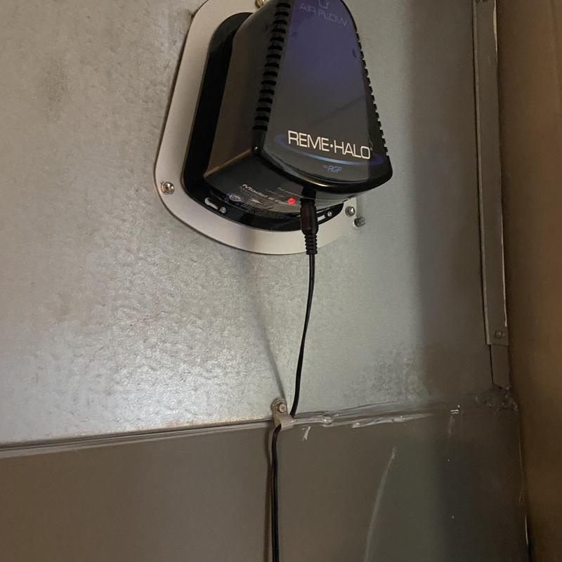 Air scrubber unit mounted on HVAC ductwork