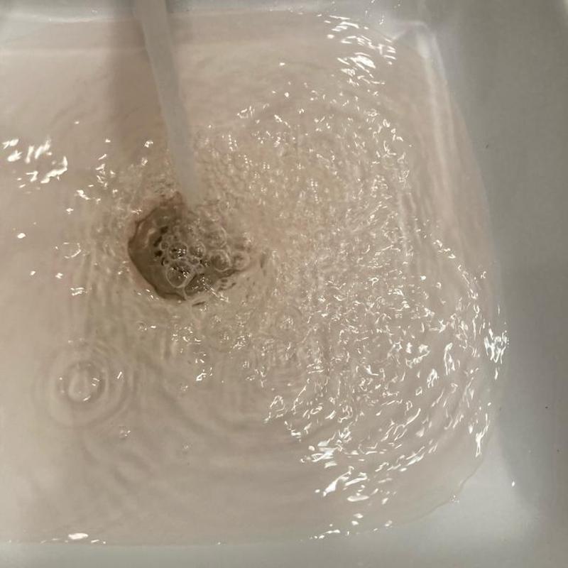 Bathroom sink drain clearing with running water Bathroom sink drain clearing with running water