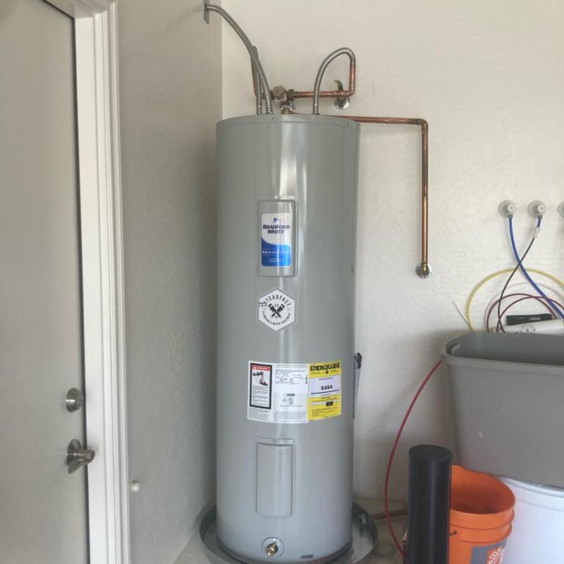 Electric Bradford White water heater with flex lines