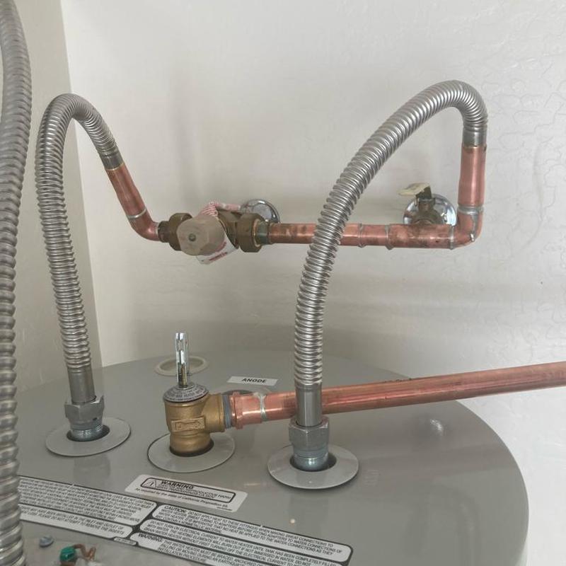 Electric water heater with new copper and flex lines