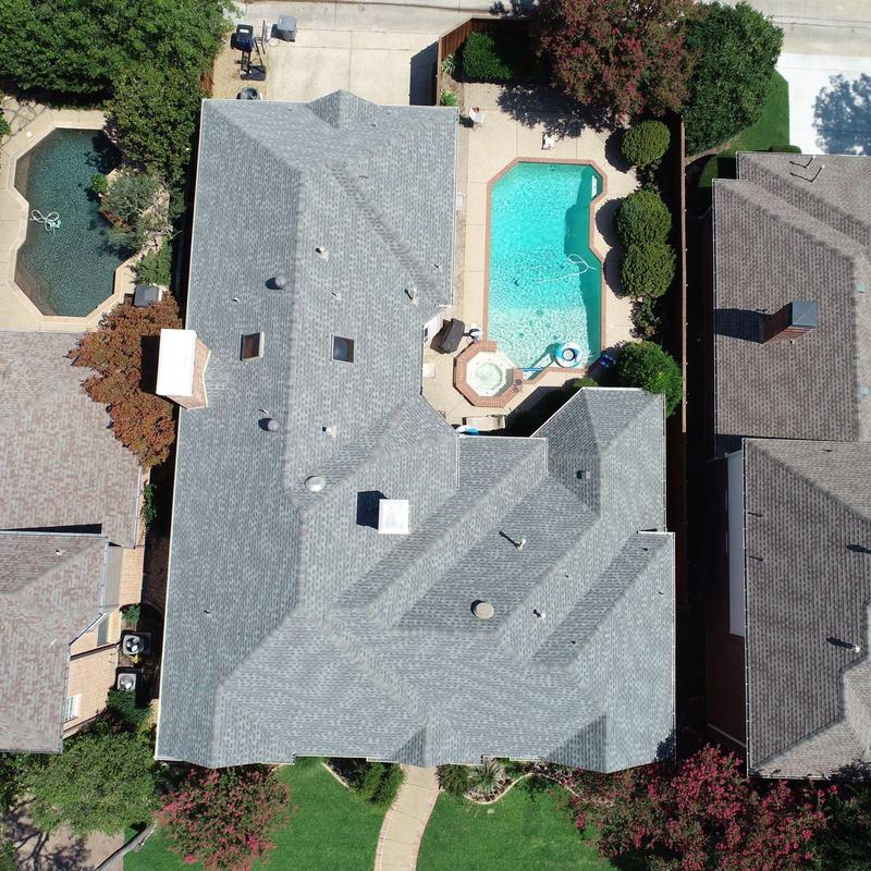 GAF Timberline slate roof replacement with tarp-covered skylights GAF Timberline slate roof replacement with tarp-covered skylights