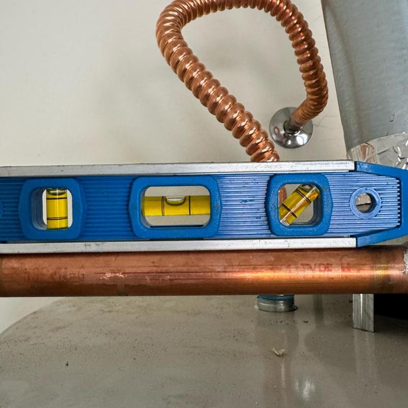 T&P copper pipe leveling with bubble level tool